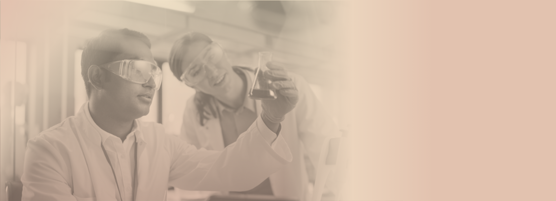 Black and white image with beige overlay of two scientists in lab coats and safety goggles looking into a beaker.